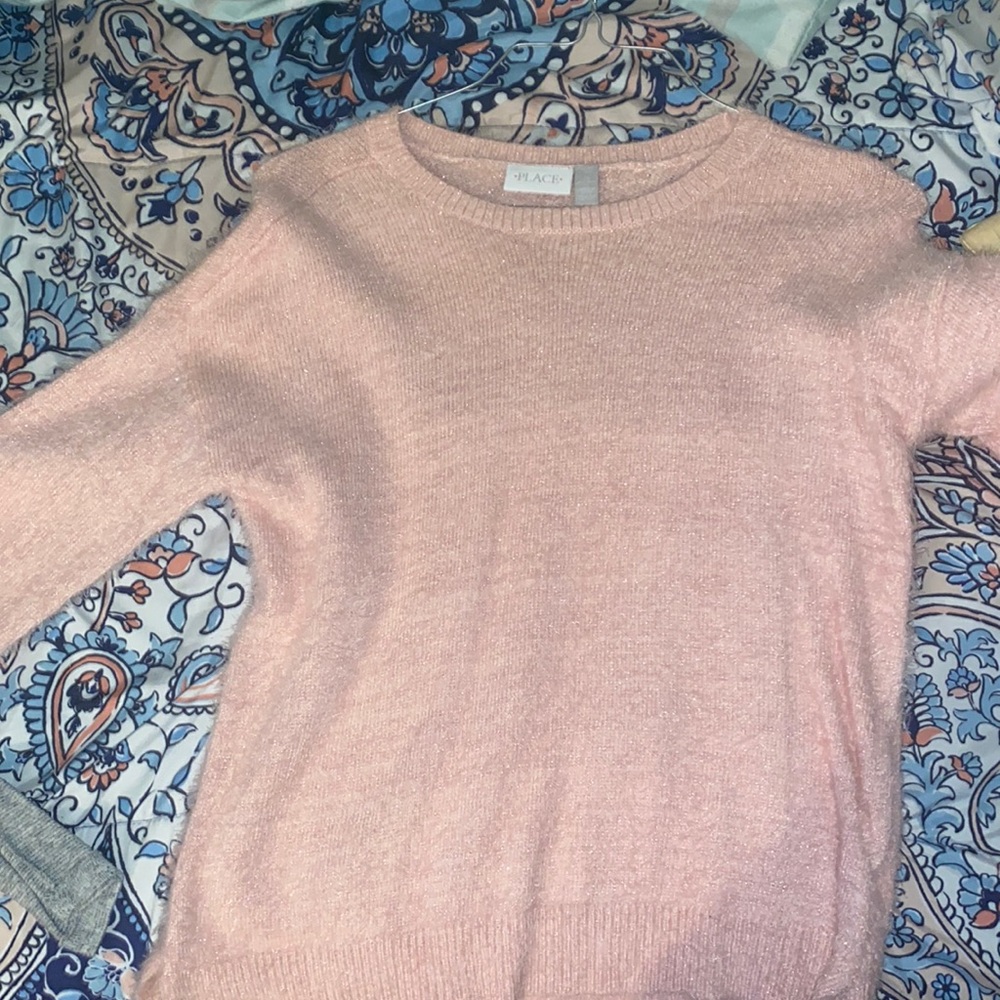 This is a long sleeve shirt/ sweater